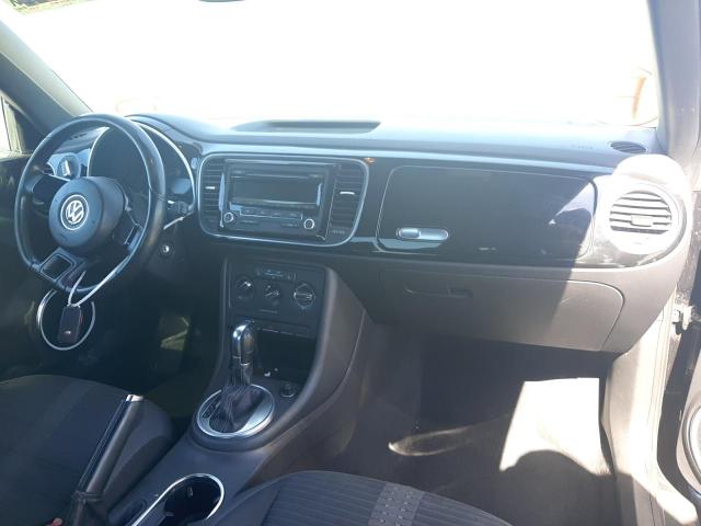 Photo 9 from auction – 2012 VOLKSWAGEN BEETLE TUR with VIN 3VWVA7AT0CM605784