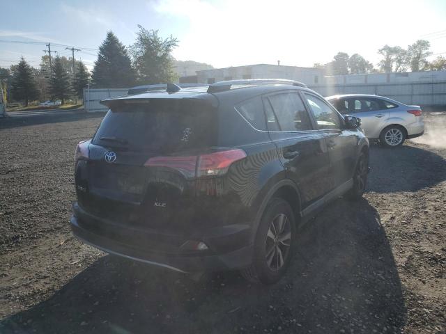 Photo 4 from auction – 2017 TOYOTA RAV4 XLE with VIN 2T3WFREV3HW330918