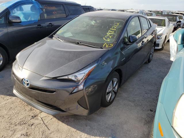 Photo 2 from auction – 2016 TOYOTA PRIUS with VIN JTDKARFUXG3014520