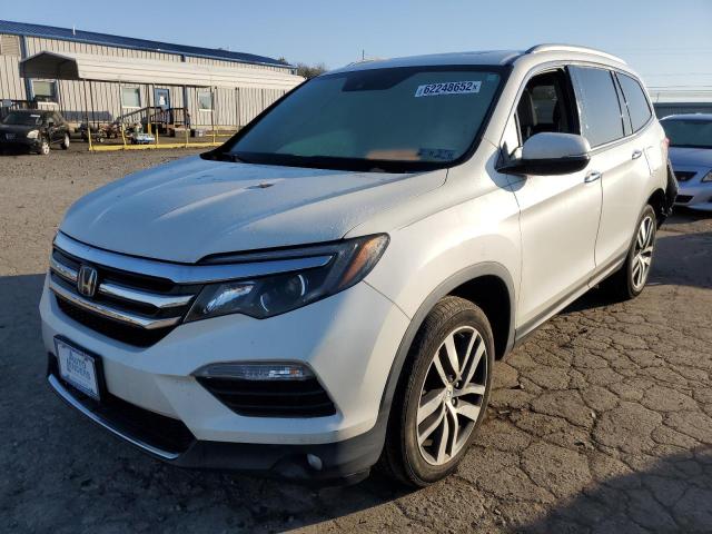Photo 2 from auction – 2017 HONDA PILOT TOUR with VIN 5FNYF6H92HB017256