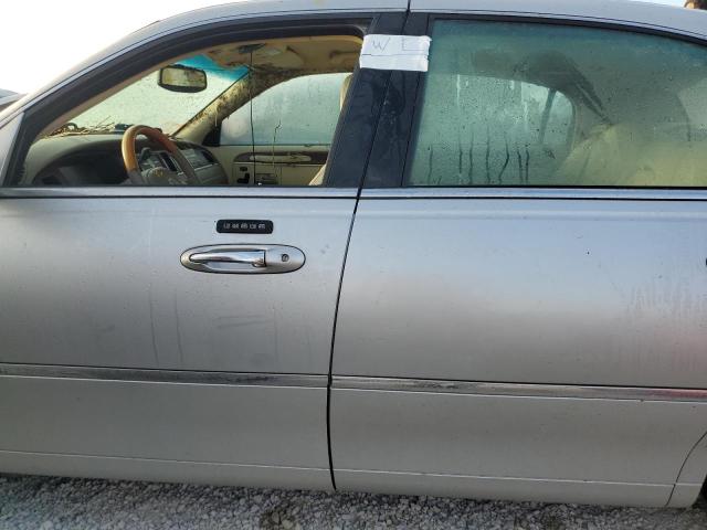 Photo 9 from auction – 2004 LINCOLN TOWN CAR U with VIN 1LNHM83W04Y658328