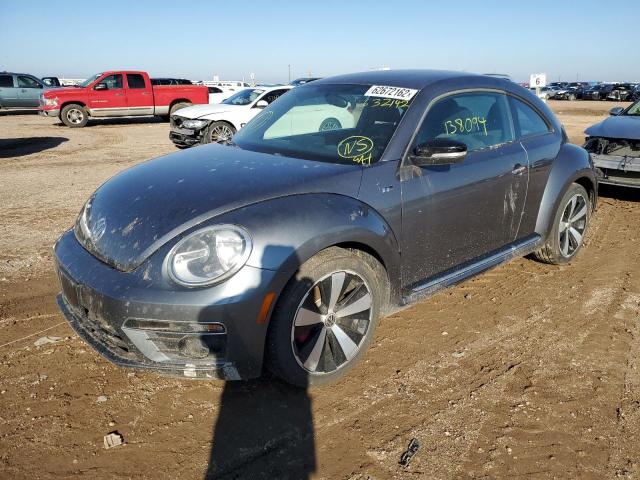 Photo 2 from auction – 2014 VOLKSWAGEN BEETLE TUR with VIN 3VWVS7AT7EM632142