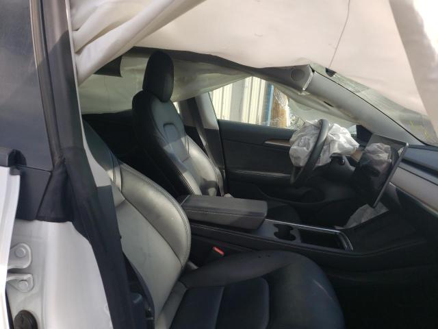 Photo 5 from auction – 2021 TESLA MODEL 3 with VIN 5YJ3E1EC9MF050023