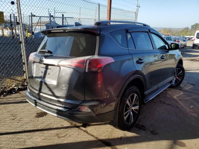 Photo 4 from auction – 2017 TOYOTA RAV4 XLE with VIN JTMRFREV7HJ702711