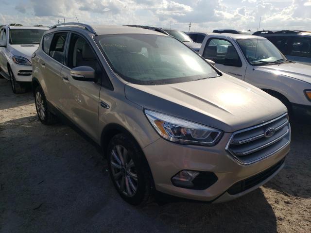 FORD ESCAPE TIT 2017 with VIN 1FMCU0JDXHUE86559 - Photo from auction