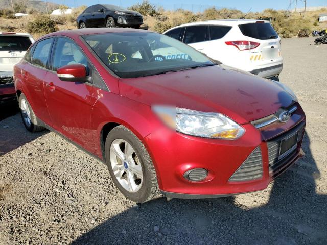 FORD FOCUS SE 2014 with VIN 1FADP3F20EL219575 - Photo from auction