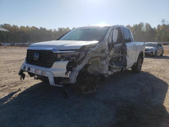 Photo 2 from auction – 2022 HONDA RIDGELINE with VIN 5FPYK3F71NB019126