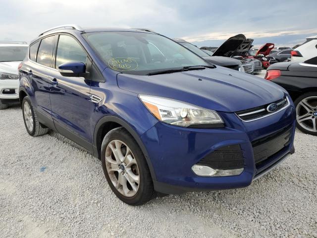 FORD ESCAPE TIT 2016 with VIN 1FMCU9JX0GUA65740 - Photo from auction