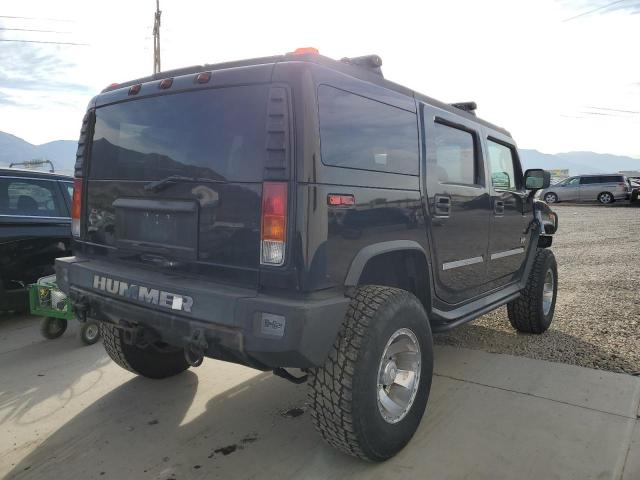 Photo 4 from auction – 2003 HUMMER H2 with VIN 5GRGN23U13H120095