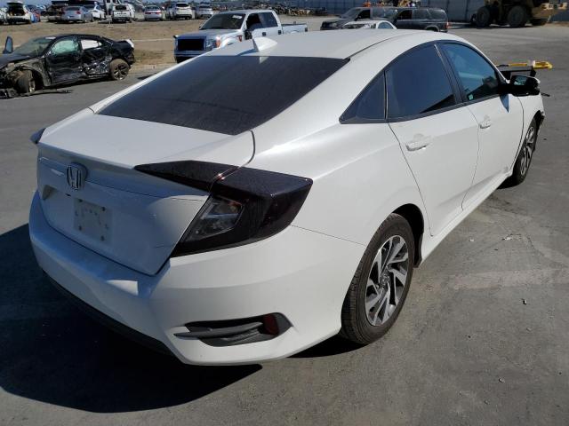 Photo 4 from auction – 2018 HONDA CIVIC EX with VIN 19XFC2F77JE208113