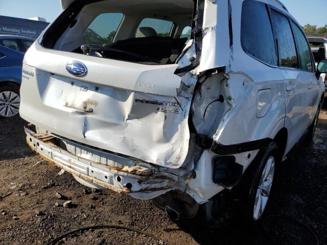 Photo 9 from auction – 2014 SUBARU FORESTER 2 with VIN JF2SJAPC7EH521335