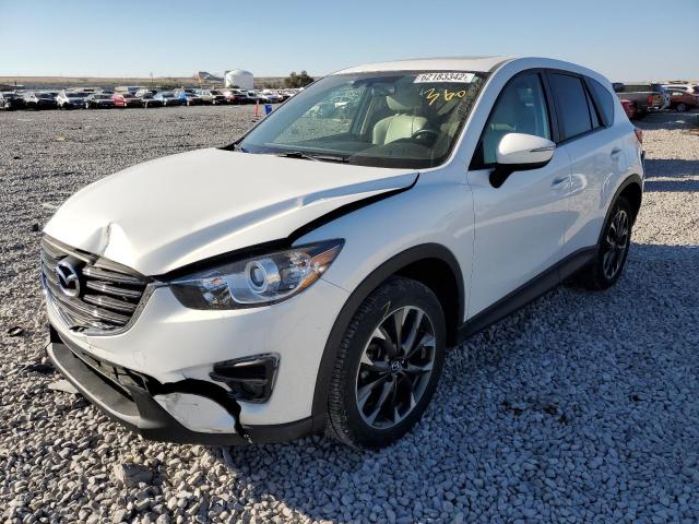 Photo 2 from auction – 2016 MAZDA CX-5 GT with VIN JM3KE4DY1G0899180