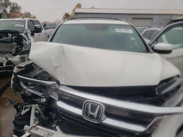 Photo 7 from auction – 2019 HONDA PILOT ELIT with VIN 5FNYF6H04KB004551