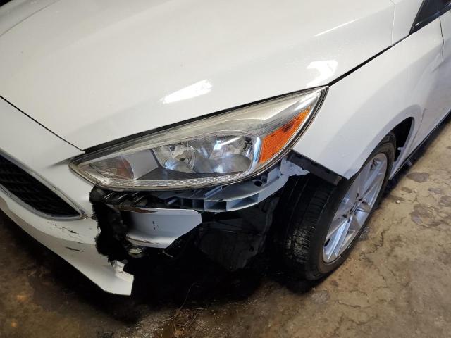 Photo 9 from auction – 2016 FORD FOCUS SE with VIN 1FADP3F26GL300583
