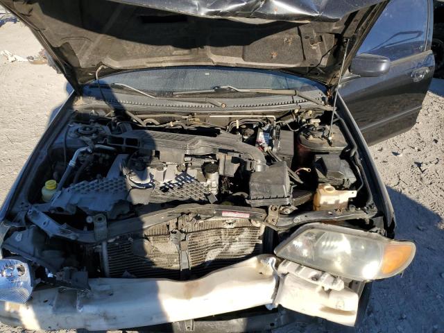 Photo 7 from auction – 2003 MAZDA PROTEGE DX with VIN JM1BJ226X31115903