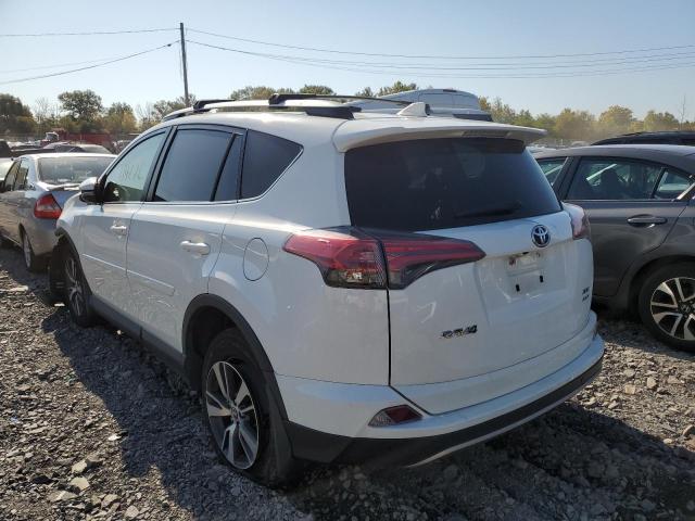 Photo 3 from auction – 2017 TOYOTA RAV4 XLE with VIN JTMRFREV1HJ116795