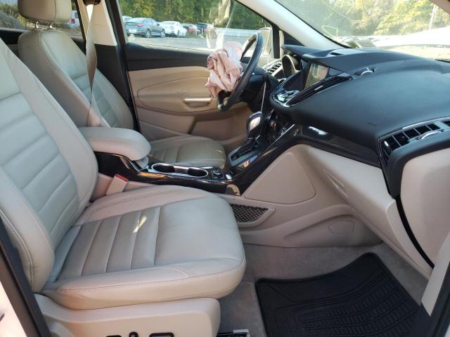 Photo 5 from auction – 2016 FORD ESCAPE TIT with VIN 1FMCU9JX8GUA58504