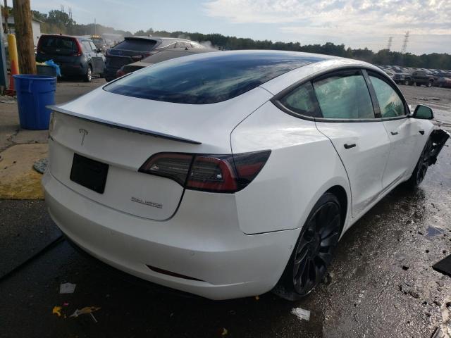Photo 4 from auction – 2021 TESLA MODEL 3 with VIN 5YJ3E1EC9MF050023