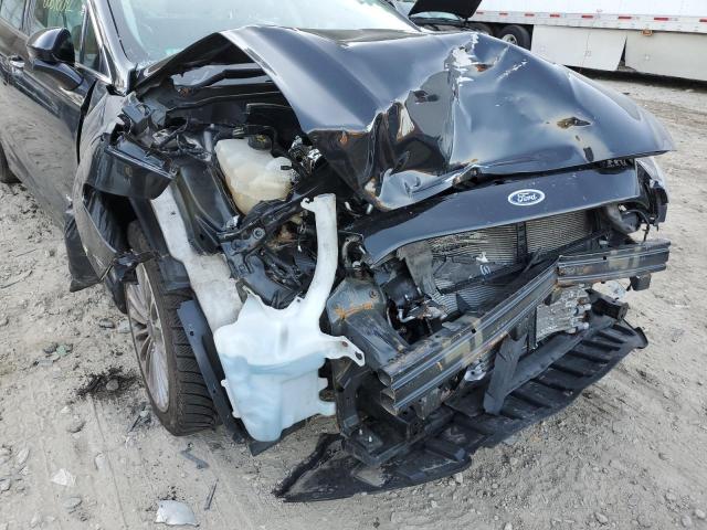 Photo 9 from auction – 2014 FORD FUSION TIT with VIN 3FA6P0RUXER238348