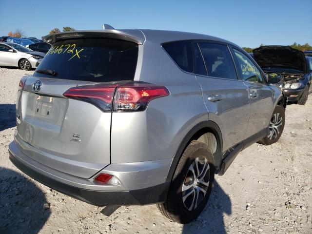 Photo 4 from auction – 2018 TOYOTA RAV4 LE with VIN JTMBFREV3JJ204593
