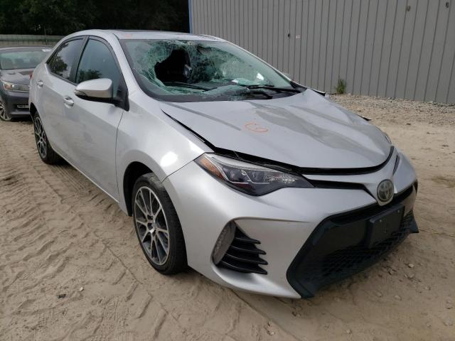 TOYOTA COROLLA L 2017 with VIN 5YFBURHE0HP641300 - Photo from auction