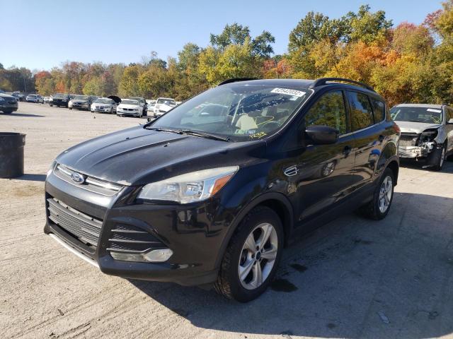 Photo 2 from auction – 2014 FORD ESCAPE SE with VIN 1FMCU9GX6EUE19667