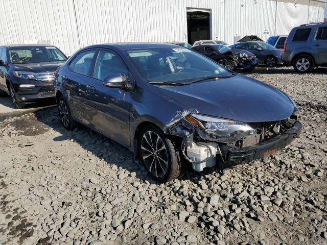TOYOTA COROLLA L 2017 with VIN 2T1BURHE1HC921193 - Photo from auction