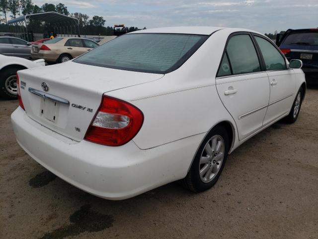 Photo 4 from auction – 2002 TOYOTA CAMRY LE with VIN JTDBF30K520043794
