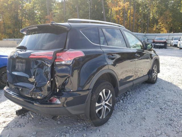 Photo 4 from auction – 2016 TOYOTA RAV4 LE with VIN 2T3BFREV0GW428141