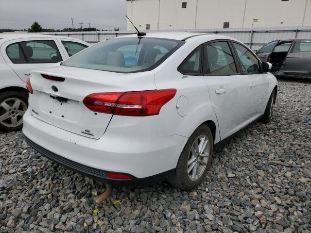 Photo 4 from auction – 2016 FORD FOCUS SE with VIN 1FADP3F26GL300583