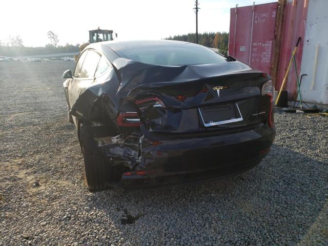 Photo 9 from auction – 2022 TESLA MODEL 3 with VIN 5YJ3E1EB2NF105047