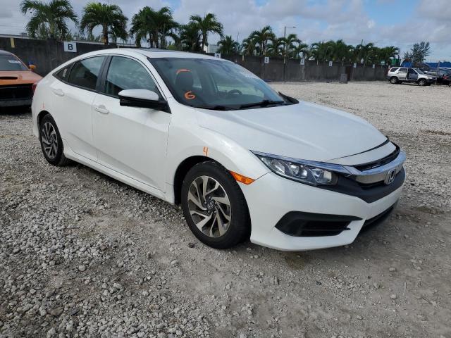 HONDA CIVIC EX 2017 with VIN 19XFC2F74HE205521 - Photo from auction