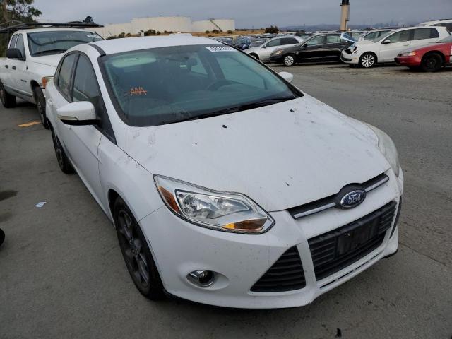 FORD FOCUS SE 2013 with VIN 1FADP3F24DL272004 - Photo from auction