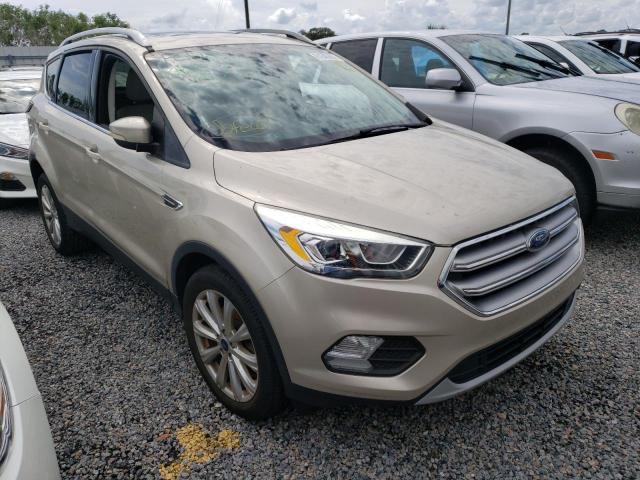 FORD ESCAPE TIT 2017 with VIN 1FMCU0J92HUC19430 - Photo from auction