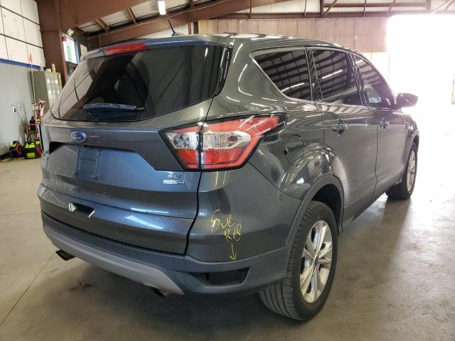 Photo 4 from auction – 2017 FORD ESCAPE SE with VIN 1FMCU9GD3HUD90039