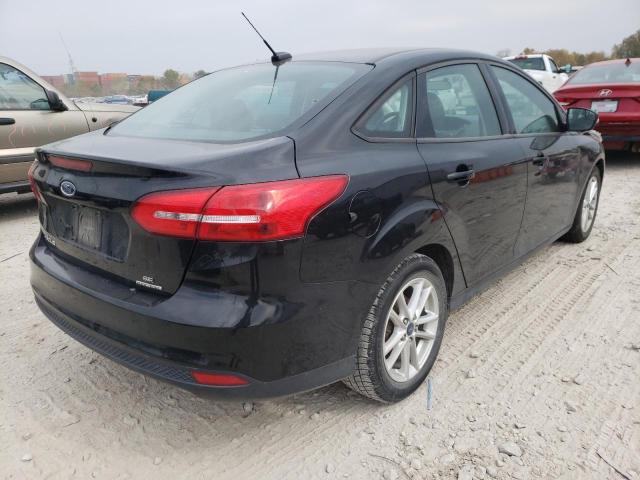 Photo 4 from auction – 2016 FORD FOCUS SE with VIN 1FADP3F28GL359229