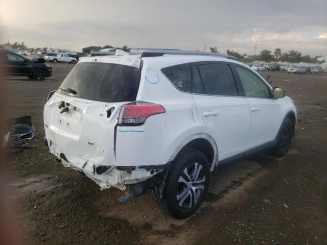 Photo 4 from auction – 2018 TOYOTA RAV4 LE with VIN JTMZFREV2JJ196758