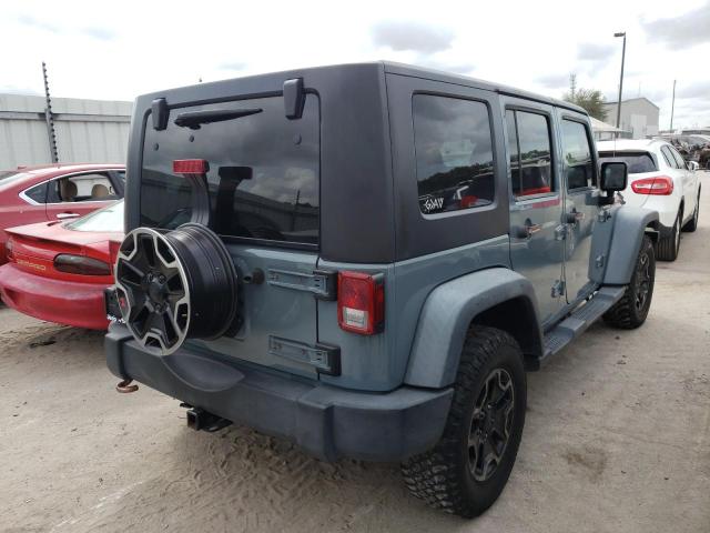Photo 4 from auction – 2014 JEEP WRANGLER U with VIN 1C4BJWDG7EL112610