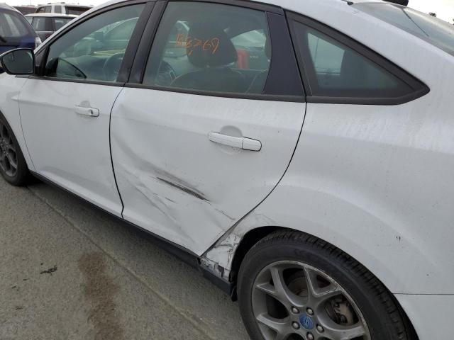 Photo 9 from auction – 2013 FORD FOCUS SE with VIN 1FADP3F24DL272004