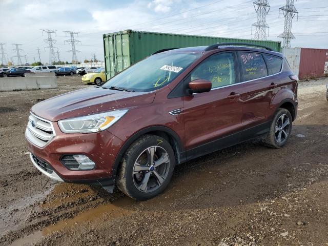 FORD ESCAPE SEL 2018 with VIN 1FMCU9HDXJUB09066 - Photo from auction