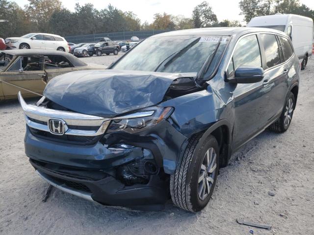 Photo 2 from auction – 2022 HONDA PILOT EXL with VIN 5FNYF5H57NB009561