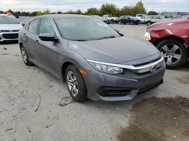 HONDA CIVIC LX 2018 with VIN 19XFC2F57JE018231 - Photo from auction