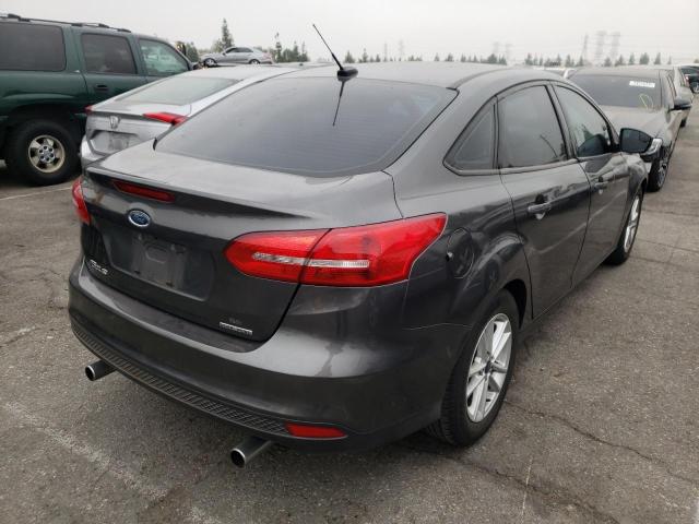 Photo 4 from auction – 2016 FORD FOCUS SE with VIN 1FADP3F29GL315563