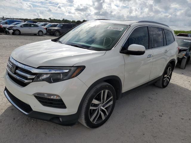 Photo 2 from auction – 2016 HONDA PILOT TOUR with VIN 5FNYF5H97GB036202