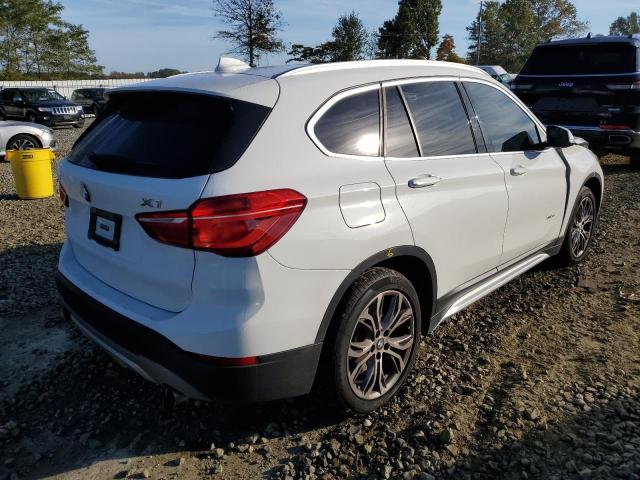 Photo 4 from auction – 2017 BMW X1 XDRIVE2 with VIN WBXHT3C30H5F73809
