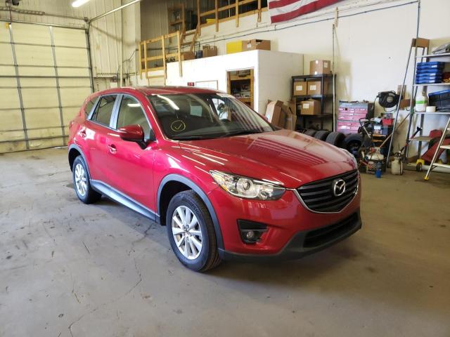 MAZDA CX-5 TOURI 2016 with VIN JM3KE4CY0G0755735 - Photo from auction