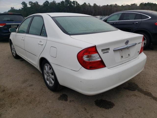 Photo 3 from auction – 2002 TOYOTA CAMRY LE with VIN JTDBF30K520043794