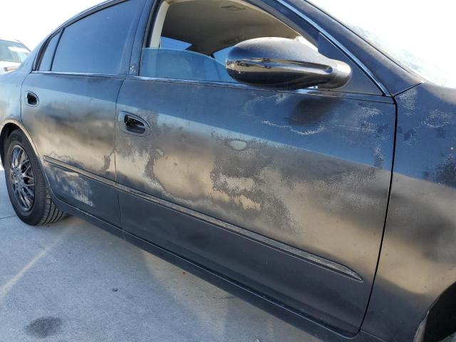 Photo 9 from auction – 2002 NISSAN ALTIMA BAS with VIN 1N4AL11D72C193712