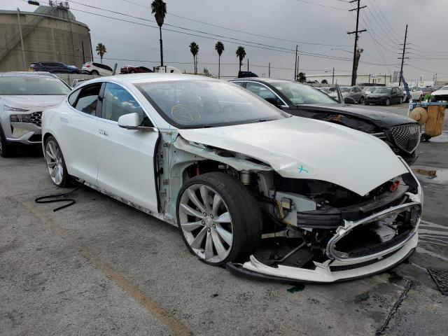 TESLA MODEL S 2014 with VIN 5YJSA1H2XEFP63525 - Photo from auction