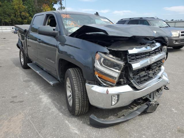 CHEVROLET SILVERADO 2018 with VIN 3GCUKREC0JG206919 - Photo from auction